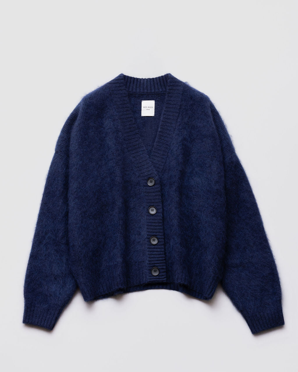Gilet oversize col V Beast Wen Moon bleu nuit Black Iris, présenté à plat